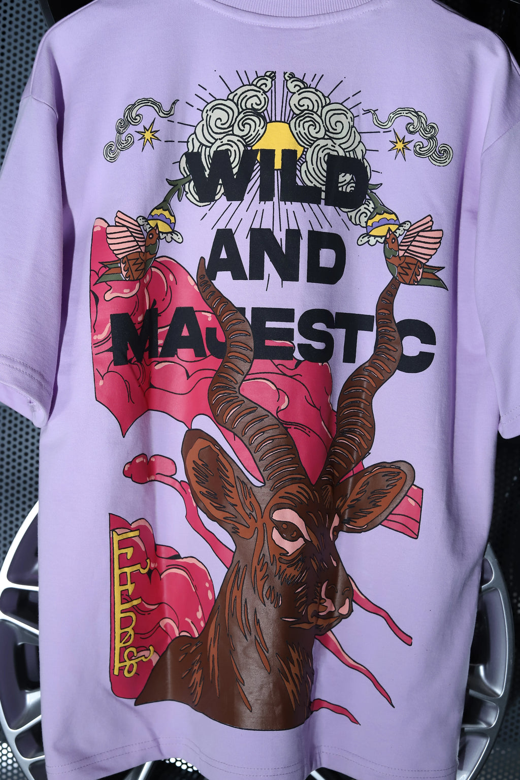 "WILD AND MAJESTIC" Cosmic Lilac Tee.